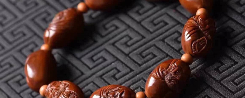 橄榄核玉化料是真的还是假的 橄榄核玉化料是真的还是假的